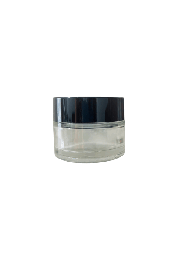 Clear glass jar with black lid